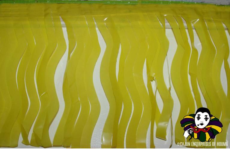 PLASTIC FLOAT FRINGE IN PURPLE GREEN AND GOLD
