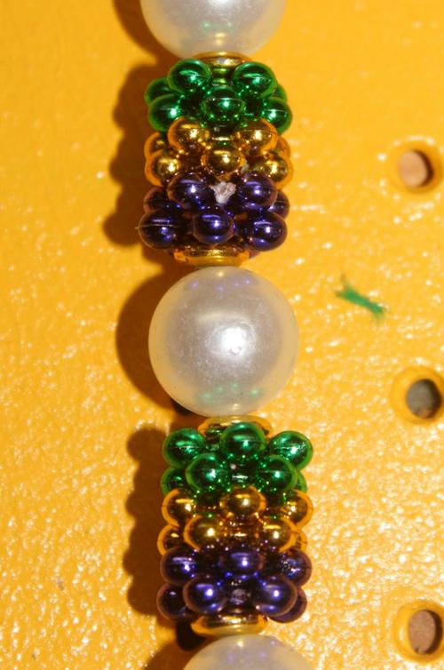PURPLE, GREEN, AND GOLD LEIS BEAD